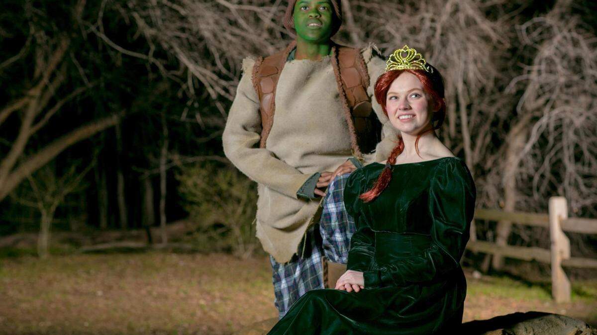 Michael Jay as Shrek and Sydney Dotson as Fiona in Theatre Arlington's production of Shrek the Musical Jr.