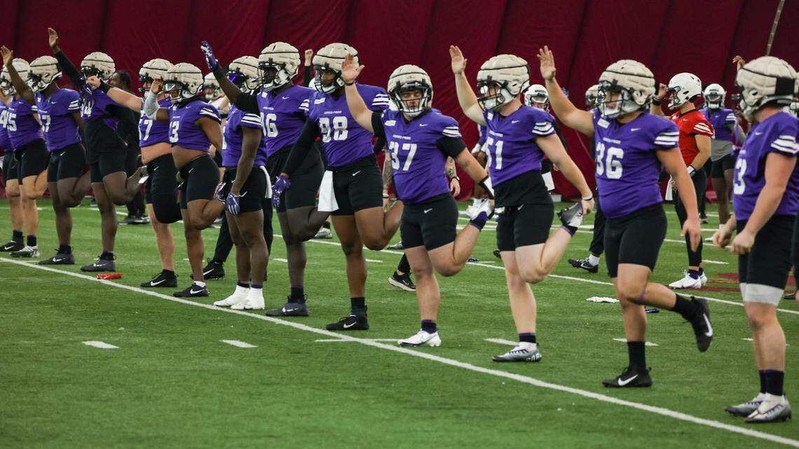 TCU players warmup prior to their practice on Wednesday. Each player received several gifts for participating in the bowl game.