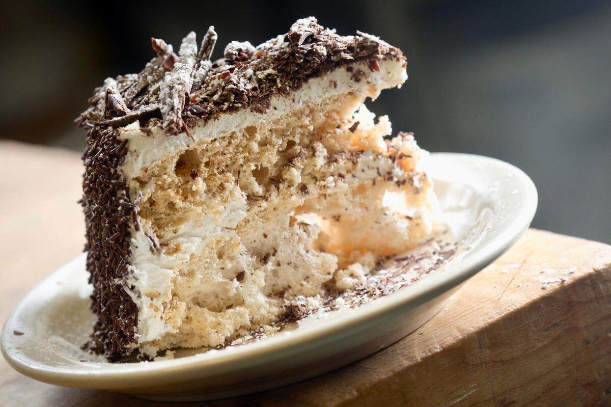 The version of Black Forest cake sold at Swiss Pastry Shop is an almond dacquoise dessert popular in Switzerland and Sweden.