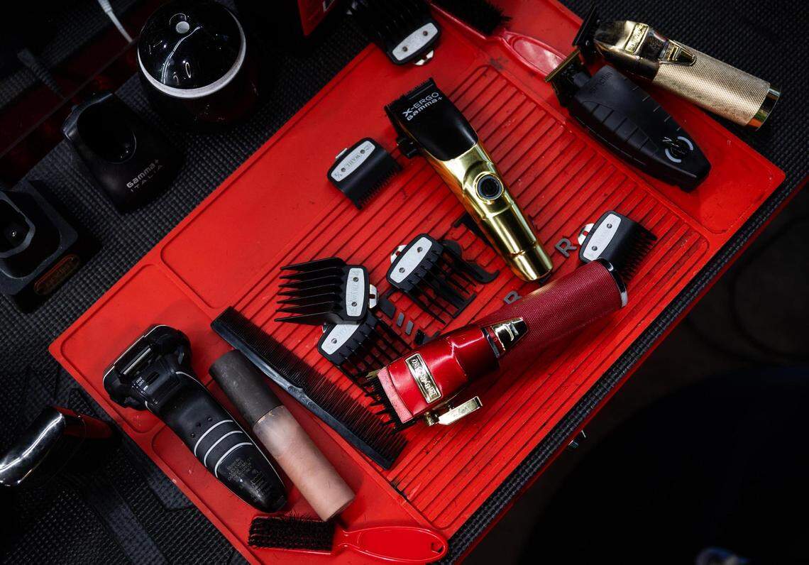 The tools of barbers while in use Friday, Aug. 12, 2022, at Texas Barber Cartel in Watauga.