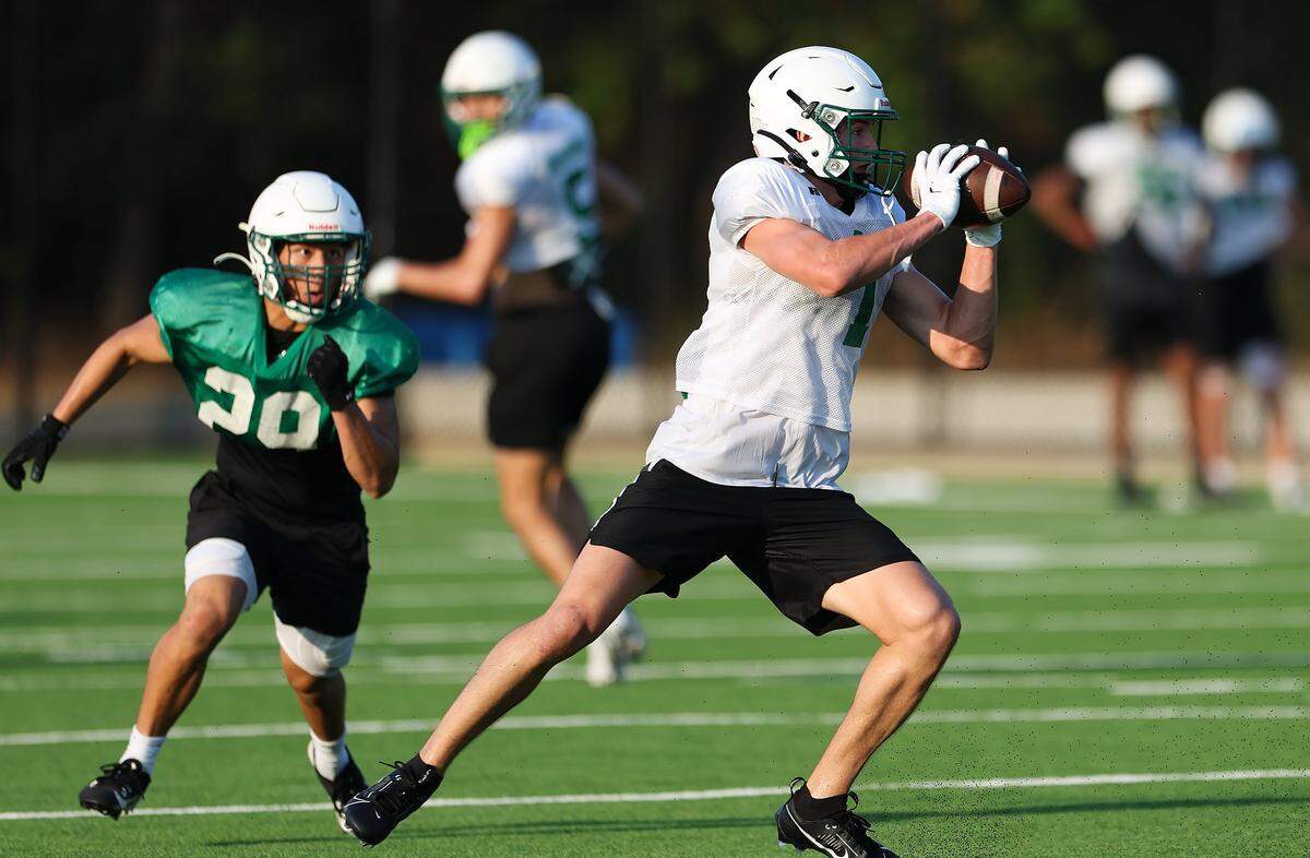 Southlake Carroll wide receiver Brock Boyd makes a catch while running drills during morning practice on Wednesday, Aug. 6, 2025, in Southlake.