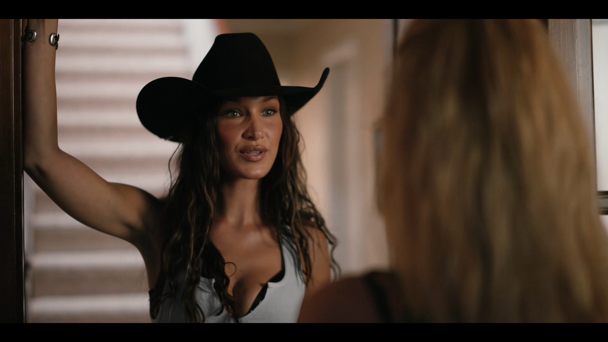 Sadie (Bella Hadid) welcome Beth (Kelly Reilly) to Texas in “Yellowstone” season 5 episode 13.