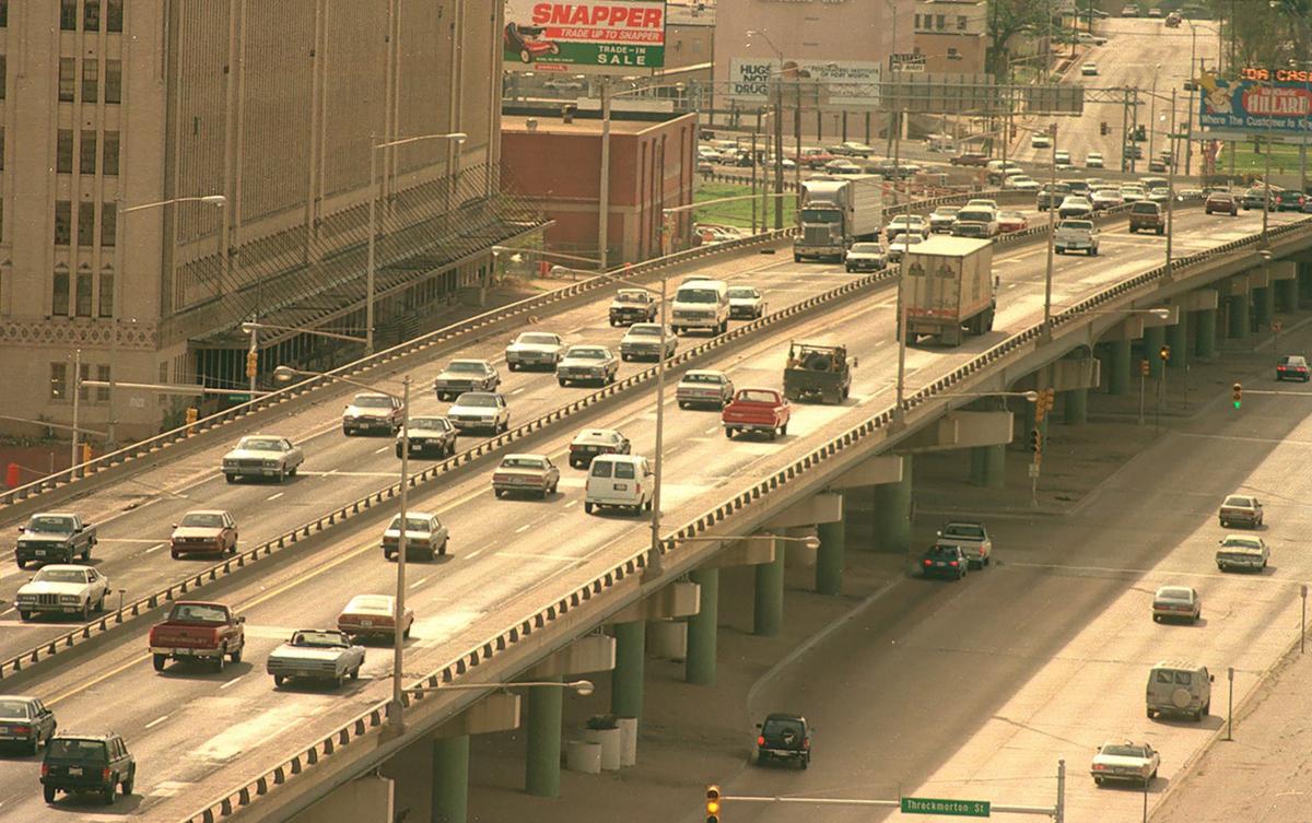 A 1989 aerial of I-30 overhead along West Lancaster passing in front of the T&P warehouse. That year, TxDOT approved a plan to move an expanded version of the overhead two blocks south, along Vickery Boulevard.