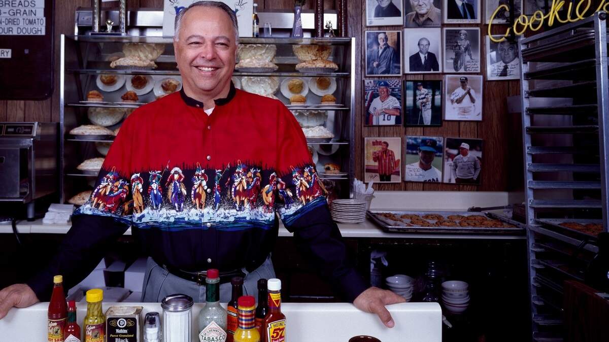 Mike Smith behind the counter at Paris Coffee Shop in the late-1980s.