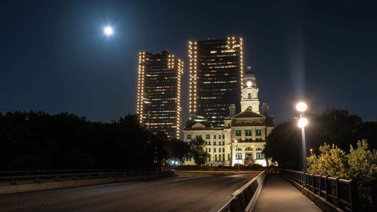 The Bank of America and Wells Fargo towers, catty corner to each other on East 2nd Street, will dim non-essential lights from 11 p.m. to 6 a.m.
