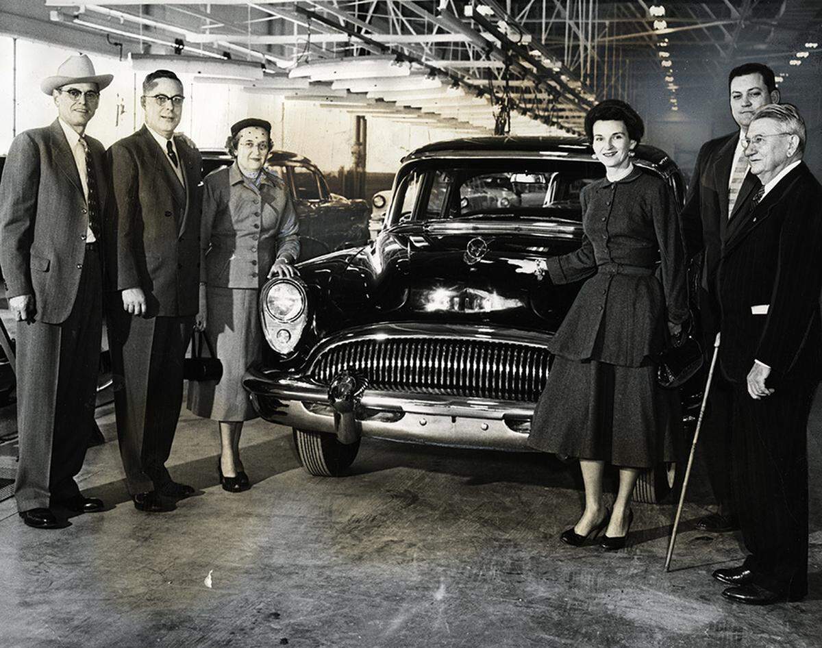 Jan. 23, 1954: The first Buick produced at the General Motors plant in Arlington is presented to Mrs. Katrine Deakins, standing left of the car, and Mrs. J. Lee Johnson III. With them are, from left, E.C. Klotzburger, plant manager; A.J. Kemp, zone manager for Buick; John Alford, assistant zone manager at Dallas; and Sanford Webb, Fort Worth Buick dealer.