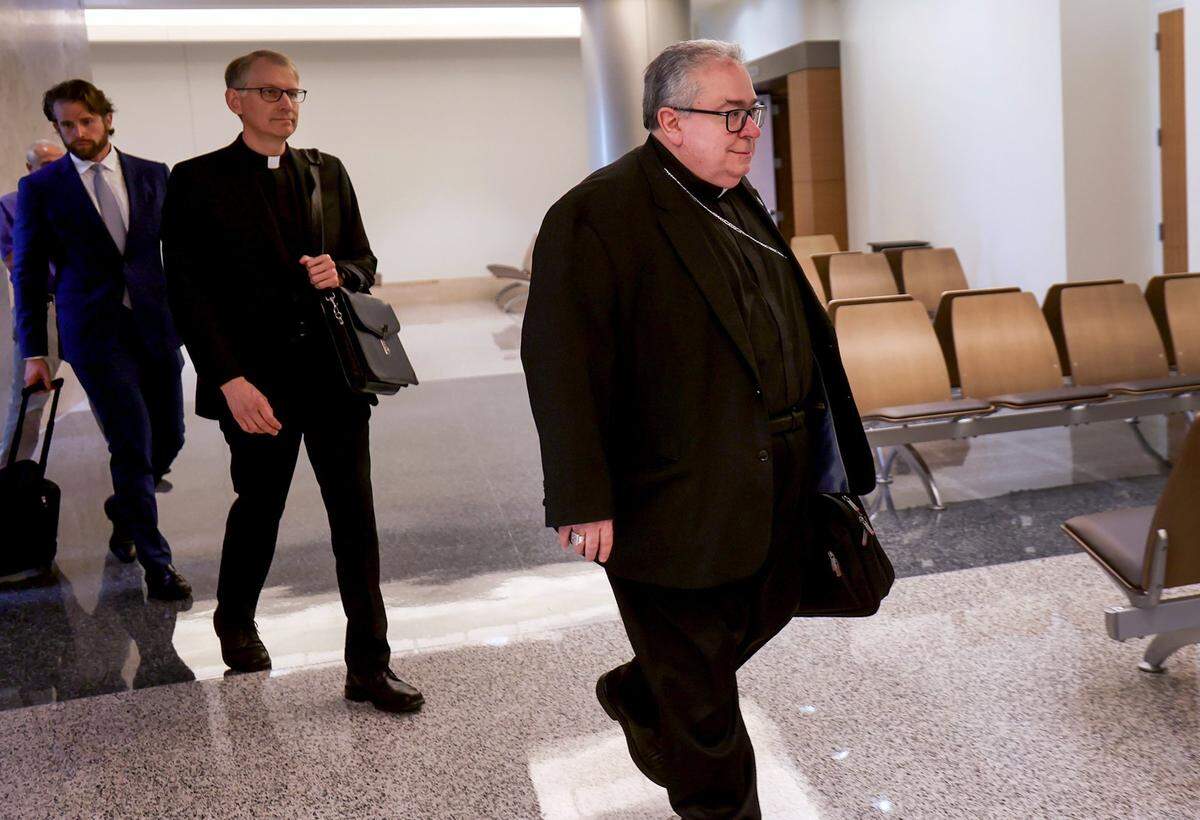 Bishop Michael Olson enters the 67th District Court in the Tom Vandergriff Civil Courts Building on Tuesday, June 27, 2023, in downtown Fort Worth. Reverend Mother Teresa Agnes Gerlach, 43, is suing Bishop Olson and the diocese for $1 million.