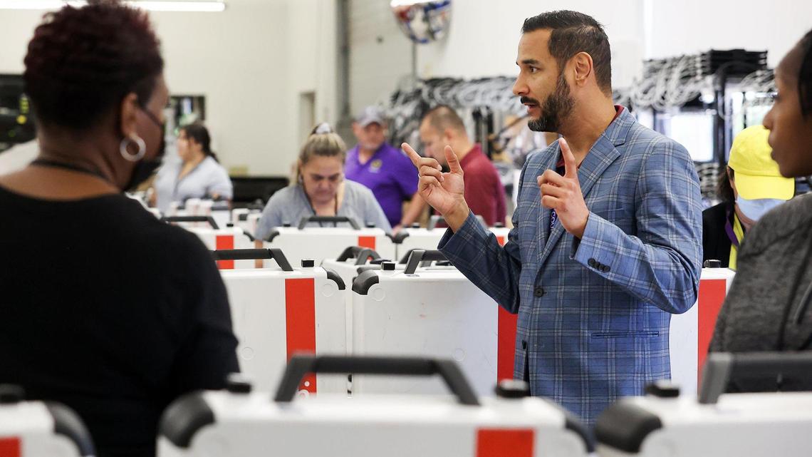 Tarrant Elections administrator Heider Garcia talks to Tarrant County employees testing voting machines on Friday, September 23, 2022, in Fort Worth.