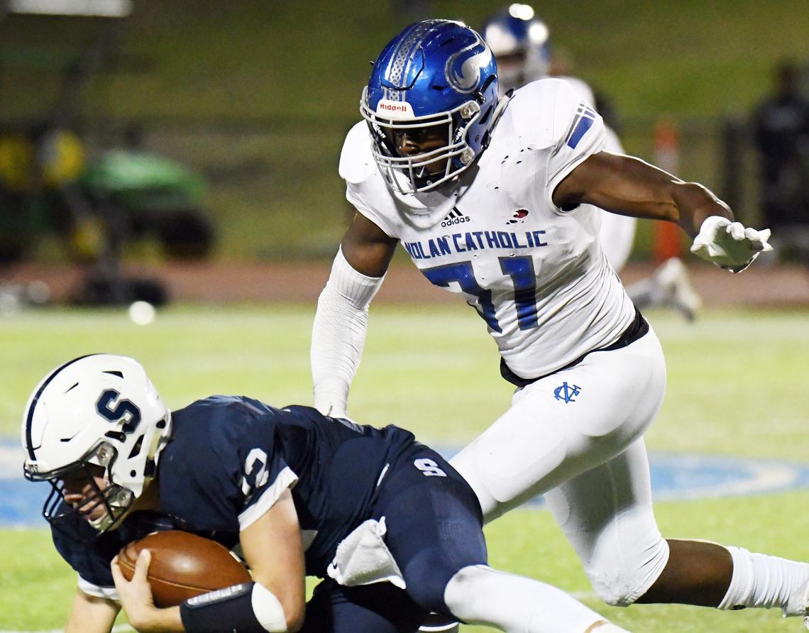 Nolan Catholic’s defensive end Nana Osafo-Mensah chases All Saints quarterback Clark Hillerman during the first Half of Friday’s November 2, 2018 football game at McNair Stadium in Fort Worth, Texas. Special/Bob Haynes