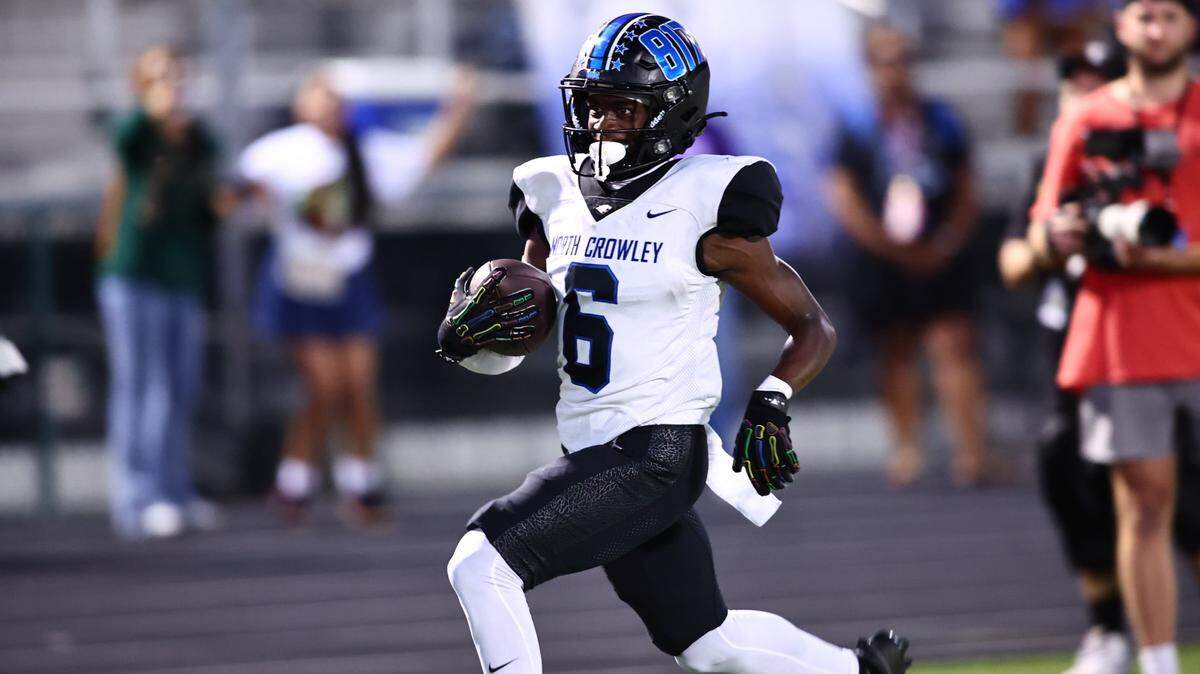 North Crowley wide receiver Quentin Gibson (6) scores on a 36-yard pass from quarterback Chris Jimerson, Jr. in the first quarter of the Panthers’ game with DeSoto on Friday, September 6, 2024 at Eagle Stadium in DeSoto, Texas. No. 5 North Crowley defeated No. 1 DeSoto 57-51.