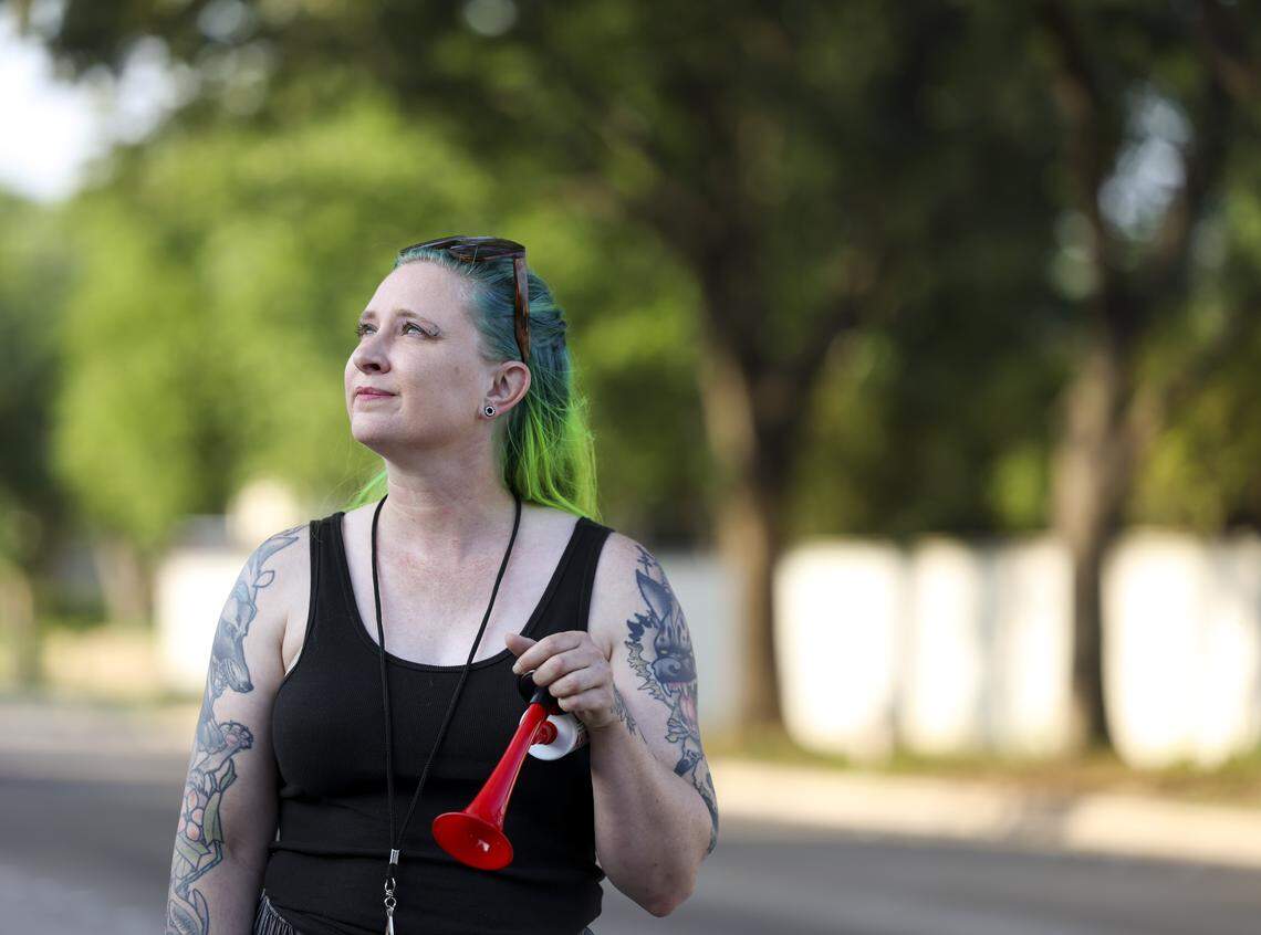 Park Glen Kelly Rybarczyk walks the streets as she looks for egrets on Thursday, April 16, 2026 in Fort Worth. Rybarczyk says the egrets have left inches of waste creating unsanitary conditions in years past.