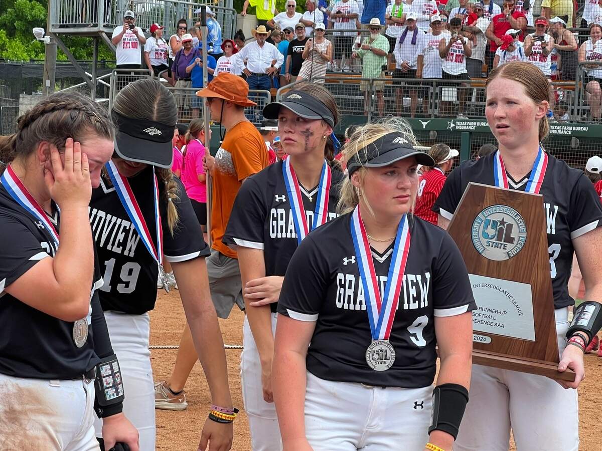 Grandview softball players receive honors as the Class 3A runner ups at Red & Charline McCombs Field on May 30, 2024.