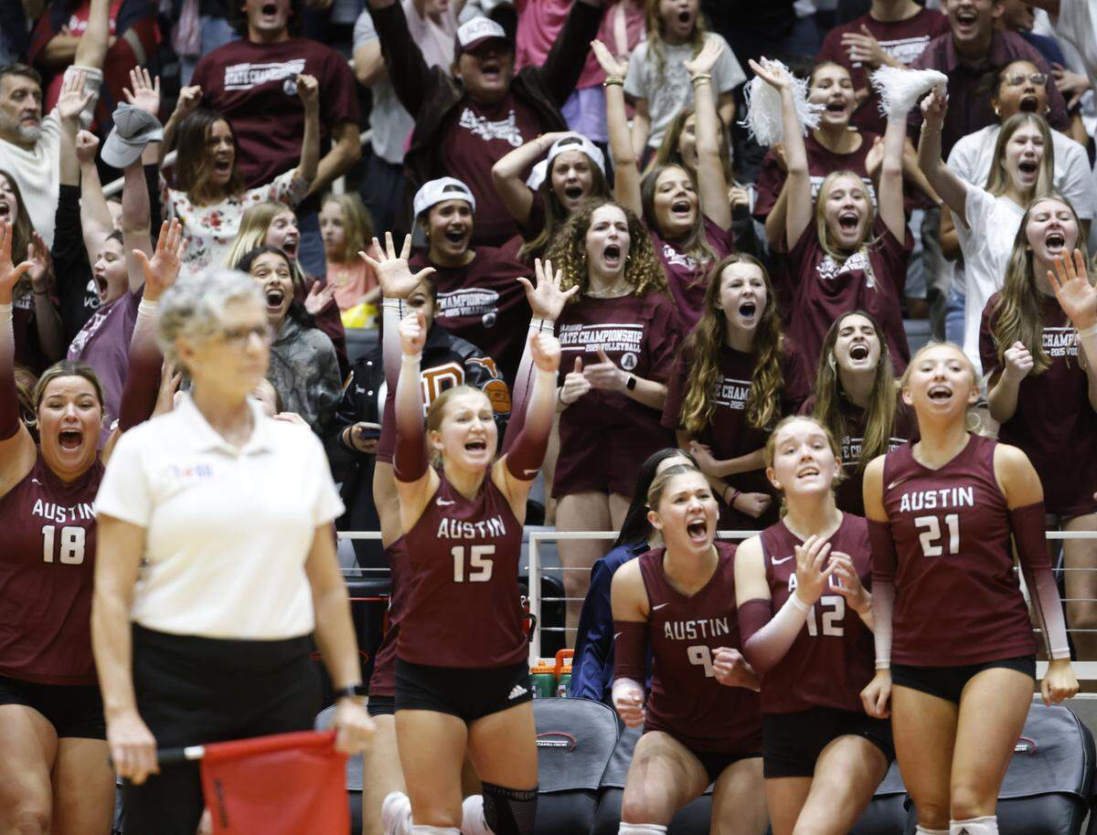 Austin Maroons celebrate winning the third set against Southlake Carroll during the UIL Class 6A Division II state volleyball championship game Saturday Nov. 22, 2025 at Curtis Culwell Center in Garland, Texas.