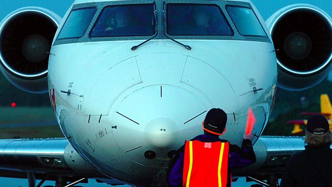 Six men are charged in a conspiracy to commit wire fraud after stealing millions of airline miles and booking flights for passengers, authorities say.