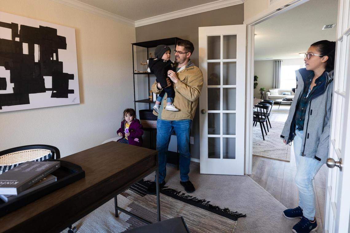 Allen and Karina Dockey with children Mazikeen, 3, and Maverick, 1, purchased a new home near Crowley.