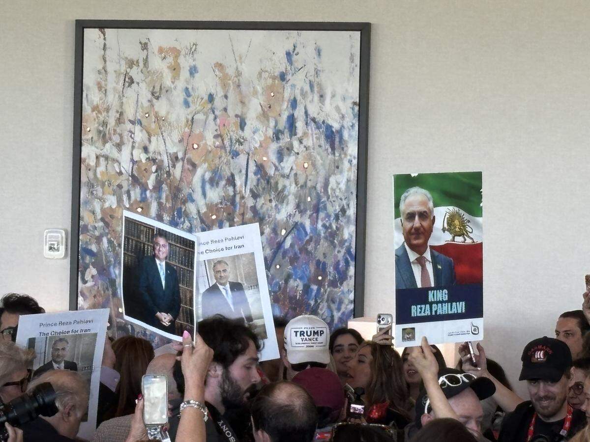 Demonstrators raised signs calling for exiled Crown Prince Reza Pahlavi to replace the Islamic Republic of Iran as the leader of the country. Pahlavi is an American ally and is set to speak at the Conservative Political Action Conference.