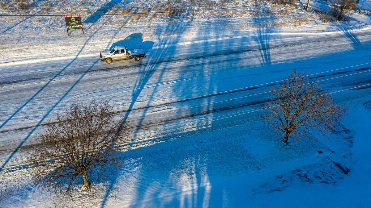 Temperatures in Granbury, Texas, dropped into single digits overnight Monday, Feb. 15, 20121, and snow flurries blanketed the region, leaving nearly four inches on the ground.