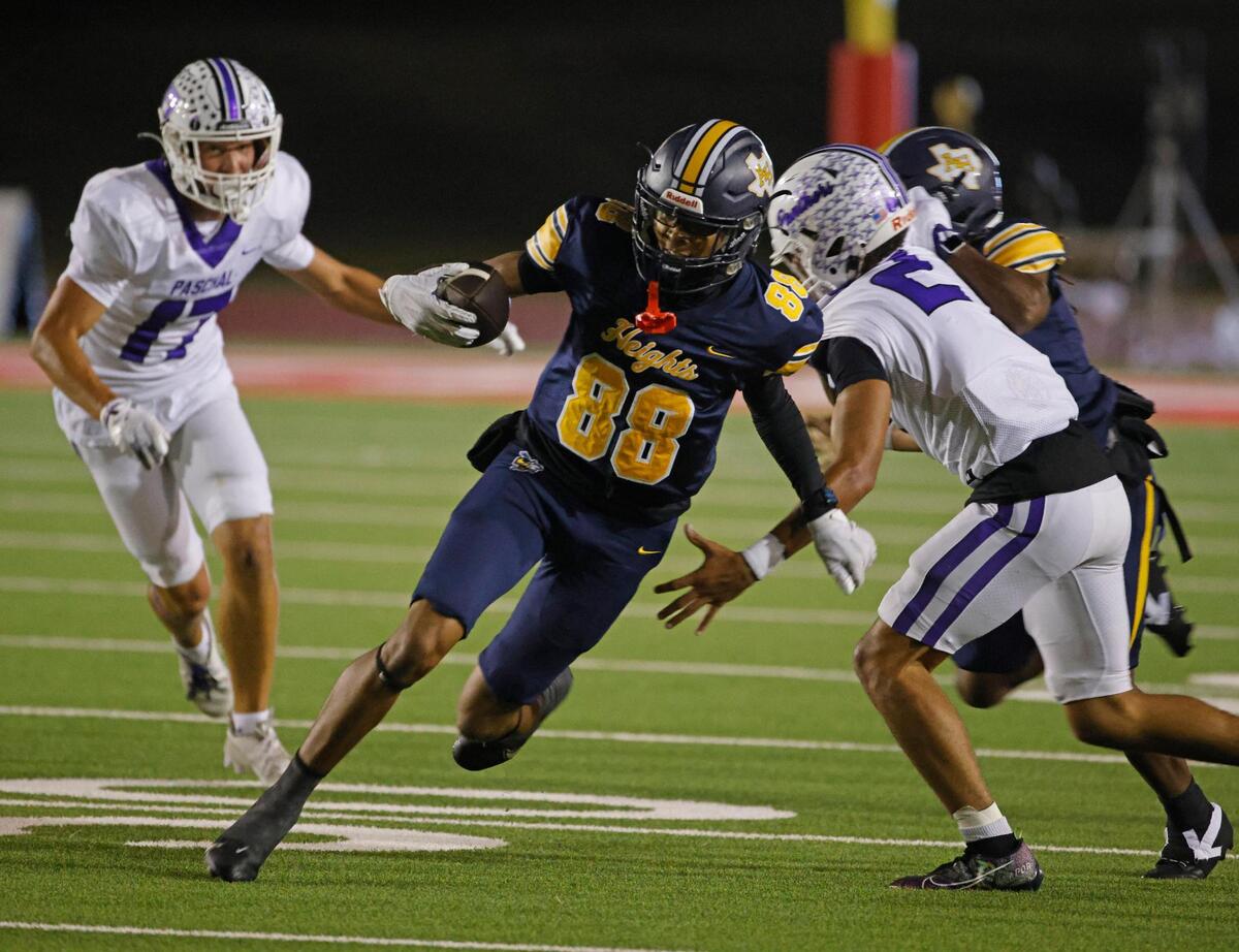Arlington Heights athlete Antonio Johnson (88) is the Star-Telegram’s No. 7 area DB to watch. 