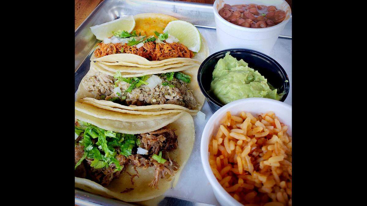 A selection of tacos and sides from Tacos Chilangos, which opened in January in a former Liberty Burger in far north Fort Worth.