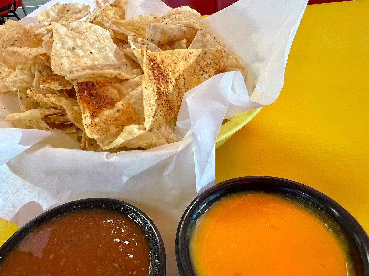 Chile-powder-dusted chips with hot sauce and cheese sauce at Chente Cafe off Interstate 20 west of Weatherford.