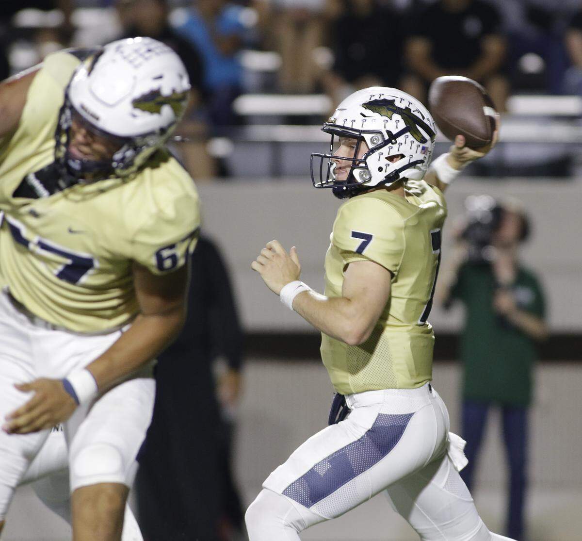 Keller quarterback Brock Burkett throws a pass against Euless Trinity during their game on Friday, October 17, 2025 at Pennington Field in Bedford, Texas.