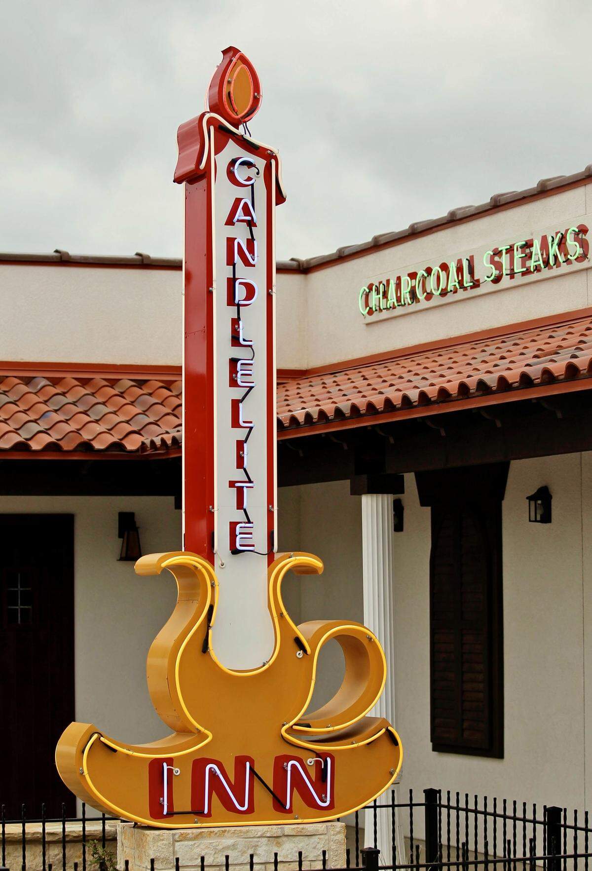 The exterior neon at the Candlelite Inn when it reopened April 1, 2014, on East Division Street in Arlington, Texas. The restaurant originally opened in 1957.