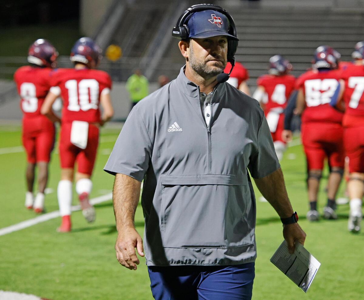Northwest head coach Bill Poe leaves the field after a time out during a District 4 6A football game at Northwest ISD Stadium in Justin, Texas, Thursday, Oct. 17, 2024.