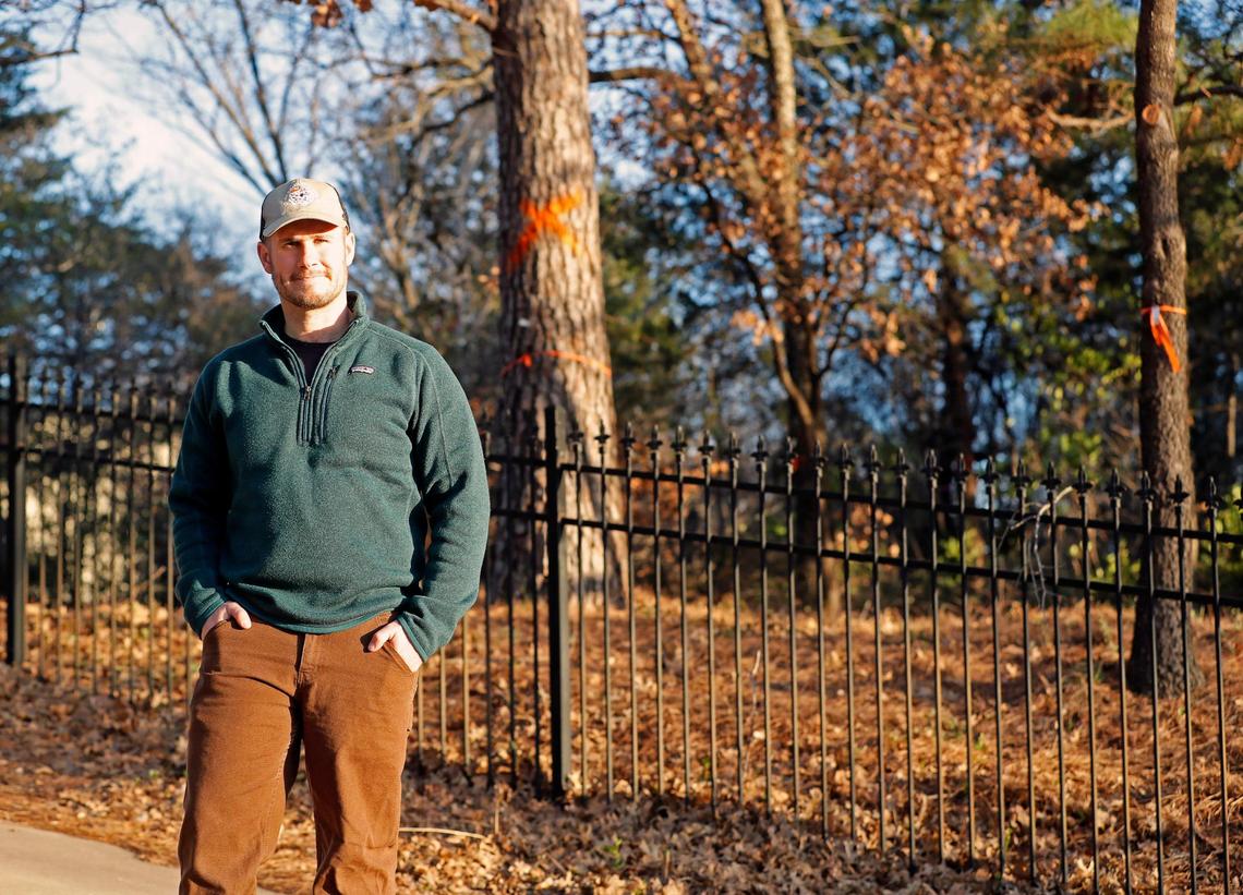 Sam Hearn near a wooded area planned for a future development in Colleyville, Texas, Wednesday, Feb. 15, 2023. A developer wants to put 19 to 21 homes on the acreage. (Special to the Star-Telegram Bob Booth)