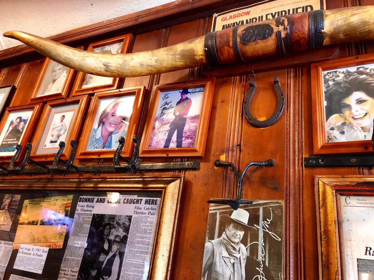 Photos line the walls of Ranchman’s, some from the 1967 movie “Bonnie and Clyde,” shot nearby.