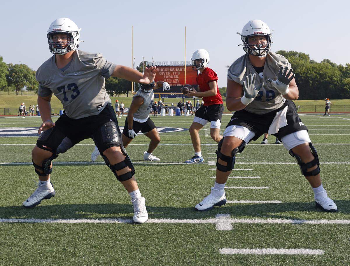 Linemen Hayden Palfreeman and Barrett Bray shore up the front offensive line during the first practice of 2025 for the All Saints in Fort Worth, Texas, Tuesday August, 05, 2025.