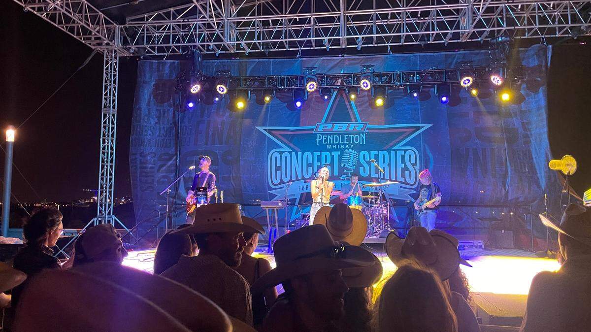 Hundreds of bull riding fans gather outside Dickies Arena for Danielle Bradburry’s post-show performance Thursday night following the first day of the Professional Bull Riding World Championship Finals in Fort Worth.