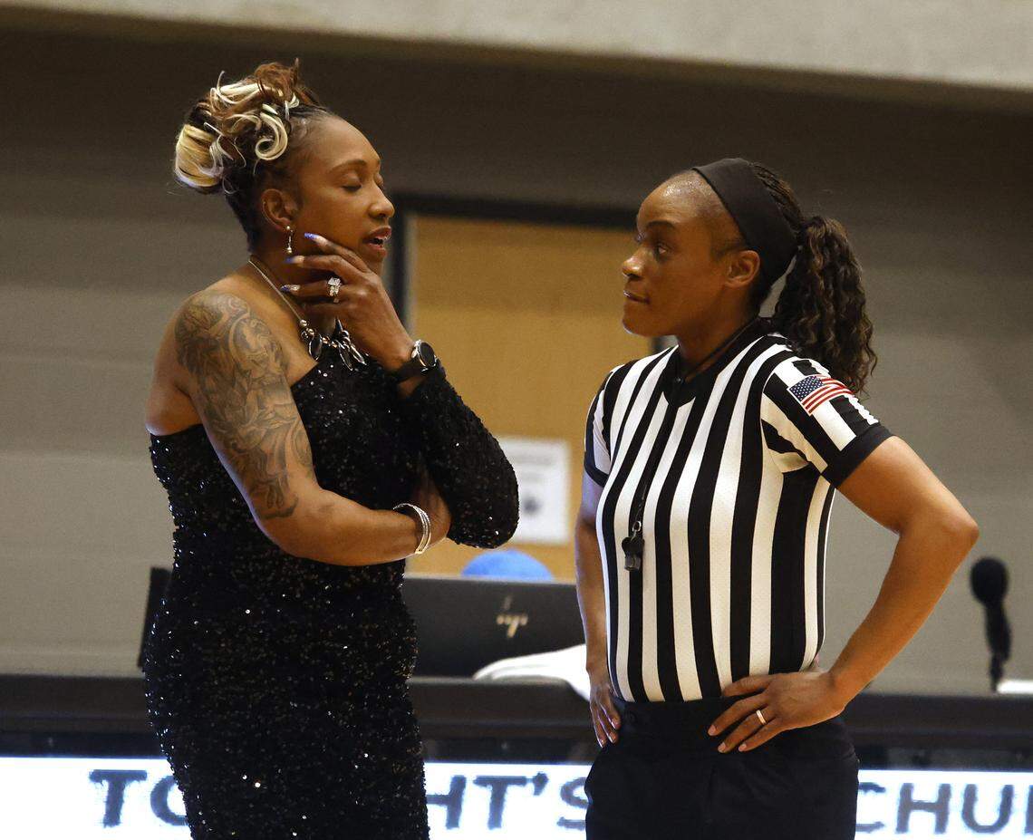 North Crowley head coach Lori Shead and an official have a conversation about a call as they play Flower Mound during the second half of a UIL Class 6A Division I girls regional final basketball playoff game at Arlington ISD Athletics Center in Arlington, Texas, Friday Feb. 27, 2026.