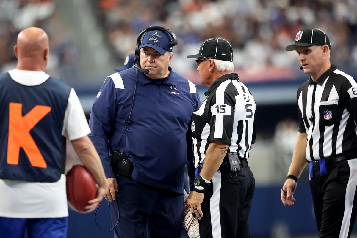 Dallas Cowboys head coach Mike McCarthy talks to the referees during the first quarter against the Cincinnati Bengals on Sunday, September 18, 2022.