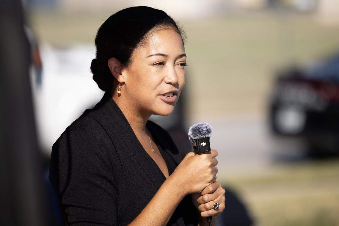 Royce Brooks, a former student of Shirley Knox Benton, speaks during Benton's street topper dedication ceremony  outside Dunbar High School in Fort Worth on Thursday, Oct. 2, 2025. 