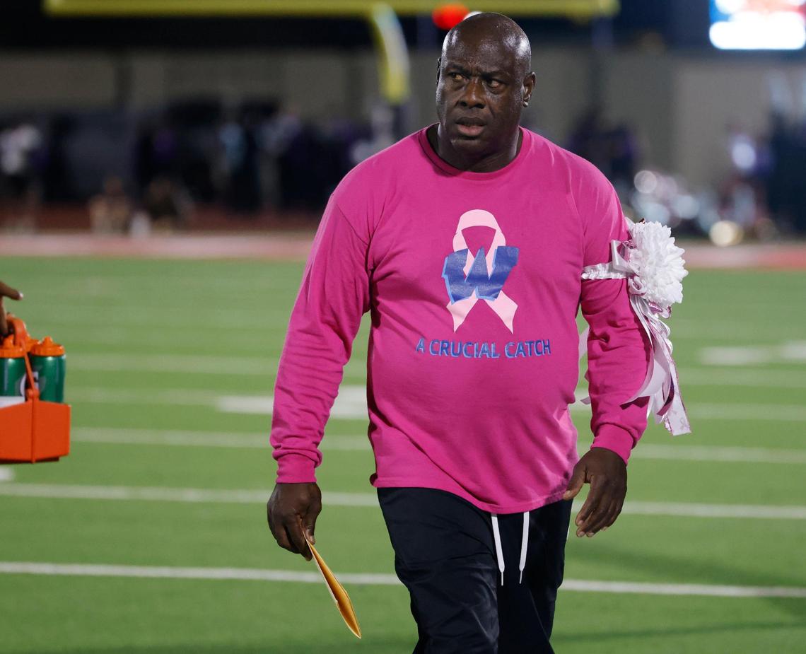 Wyatt head coach Zachary Criss glances to the field during a District 4-5A Division 1 football game at Herman Clark Stadium in Fort Worth, Texas, Thursday, Oct. 24, 2024.