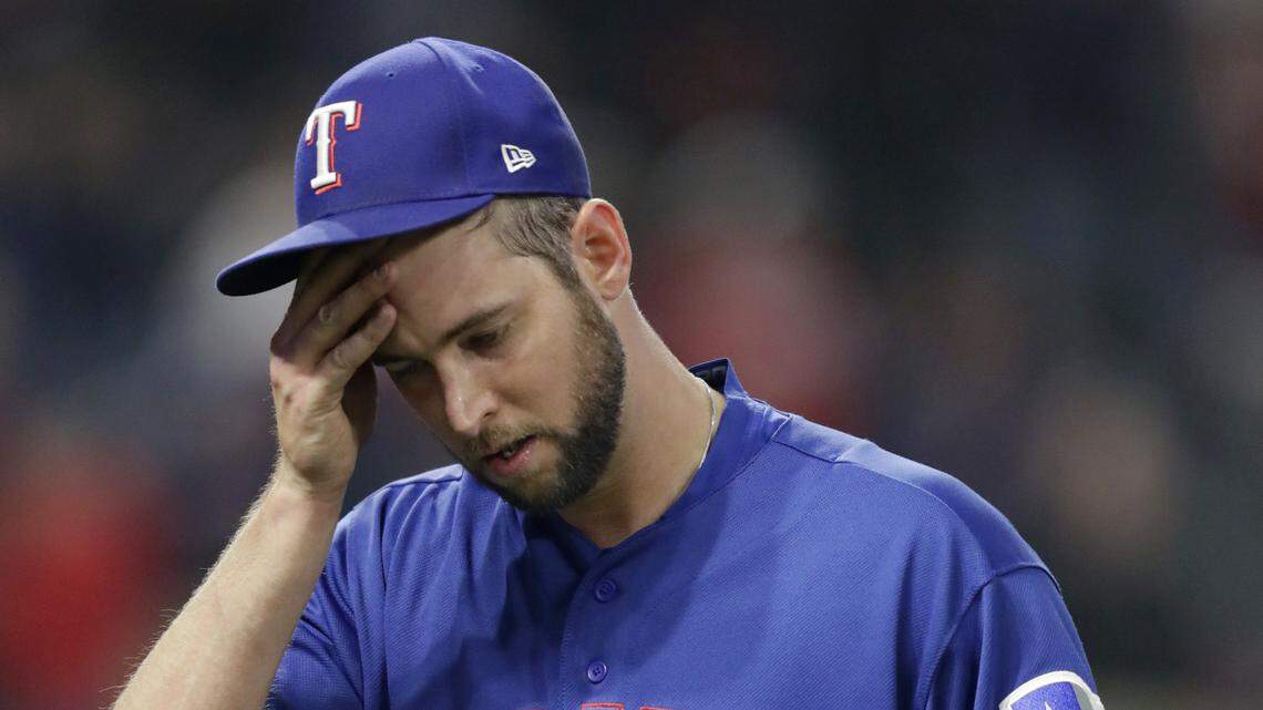 Chris Martin was dealing with a cramp in his right forearm in the eighth inning, when he was charged for four earned runs as the Indians rallied past the Rangers.