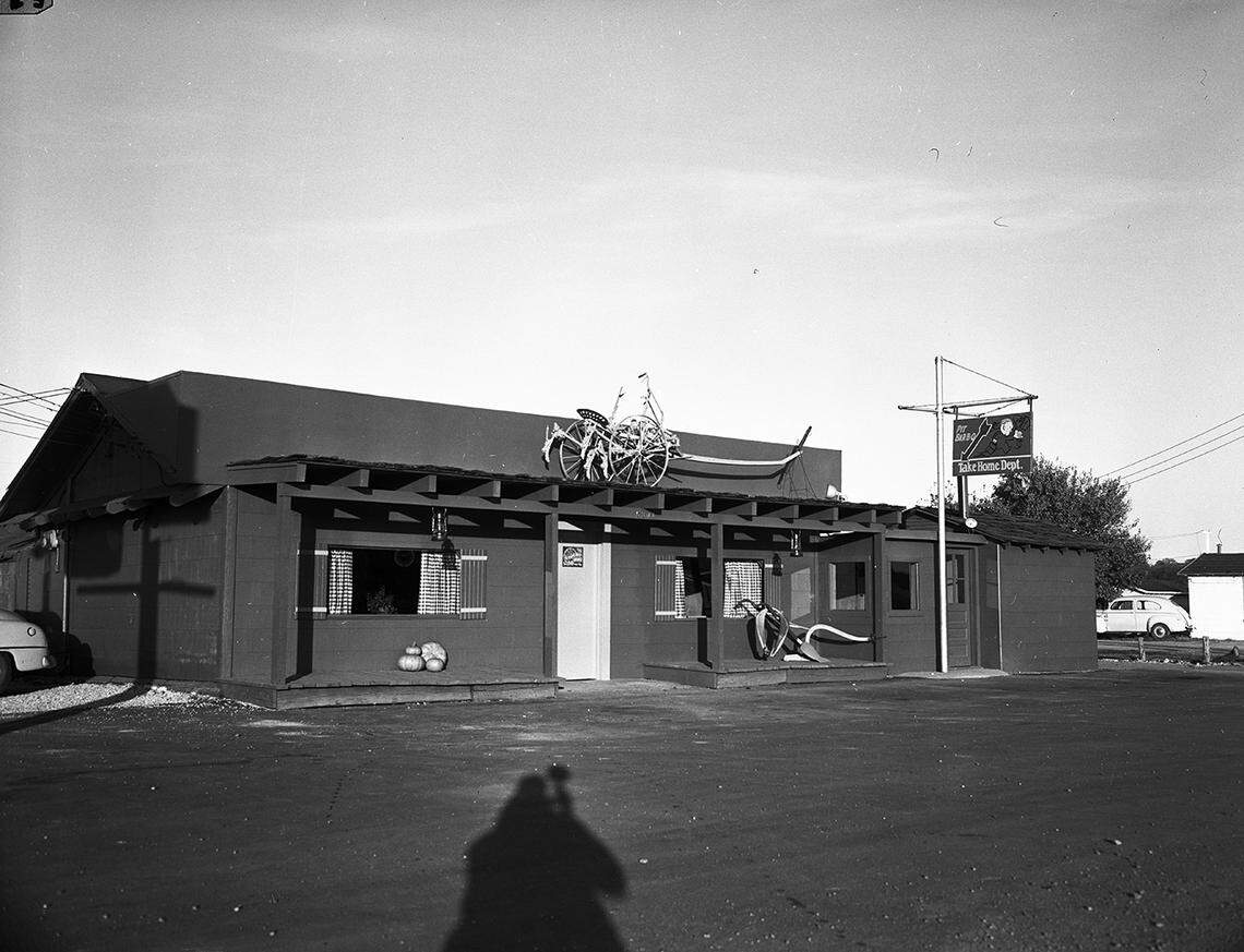 Nov. 28, 1953: Bright red farm implement against a green background brighten the exterior of a new restaurant, East Forty, at 5301 E. Lancaster Ave. The same color scheme is used inside where booths and tables provide seating space for 65 guests. (The site today is Nopalitos Taqueria y Restaurant.)