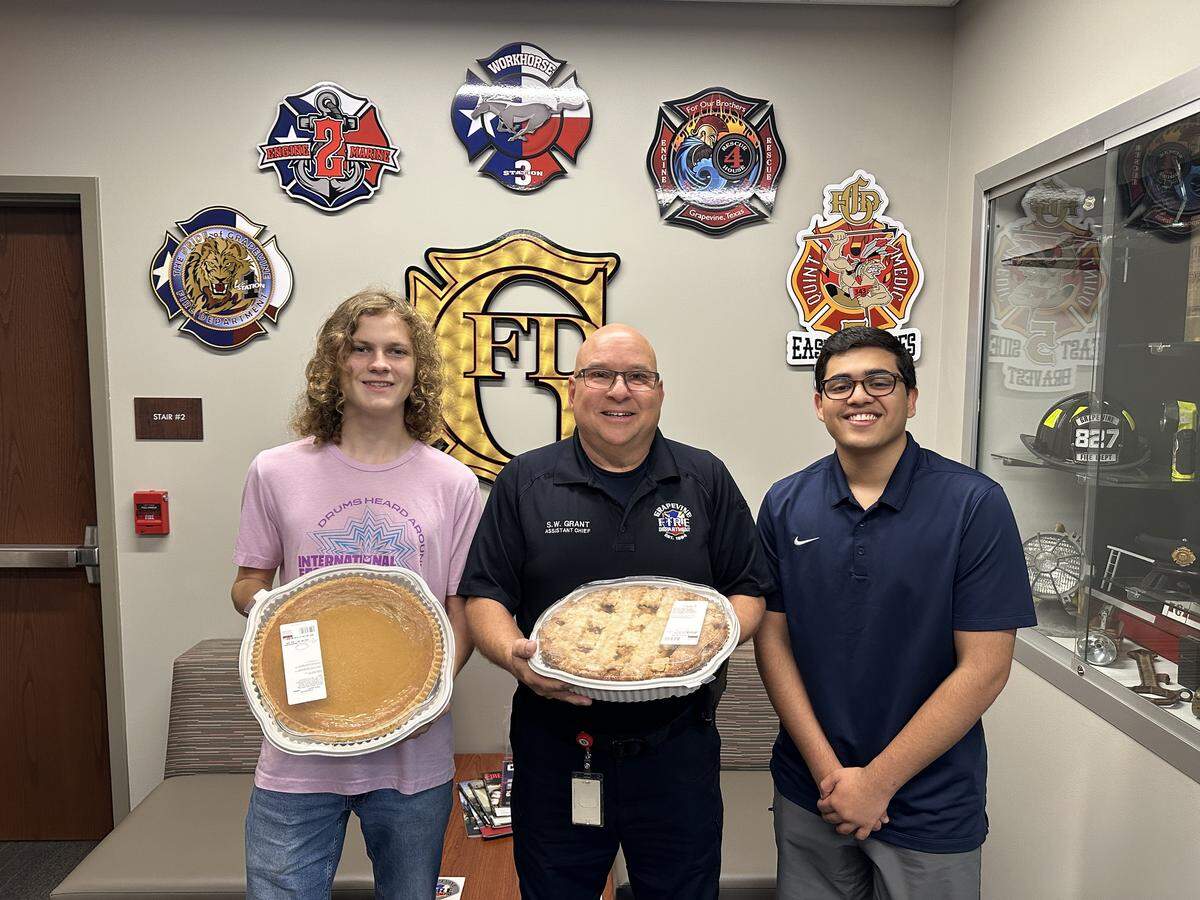 Daniel Thomas (right) and a group of friends delivered pies to North Texas first responders for Thanksgiving. The teen said he got the idea after serving as Colleyville’s “Mayor for a Day” and seeing how much work police officers and firefighters do to keep their communities safe.