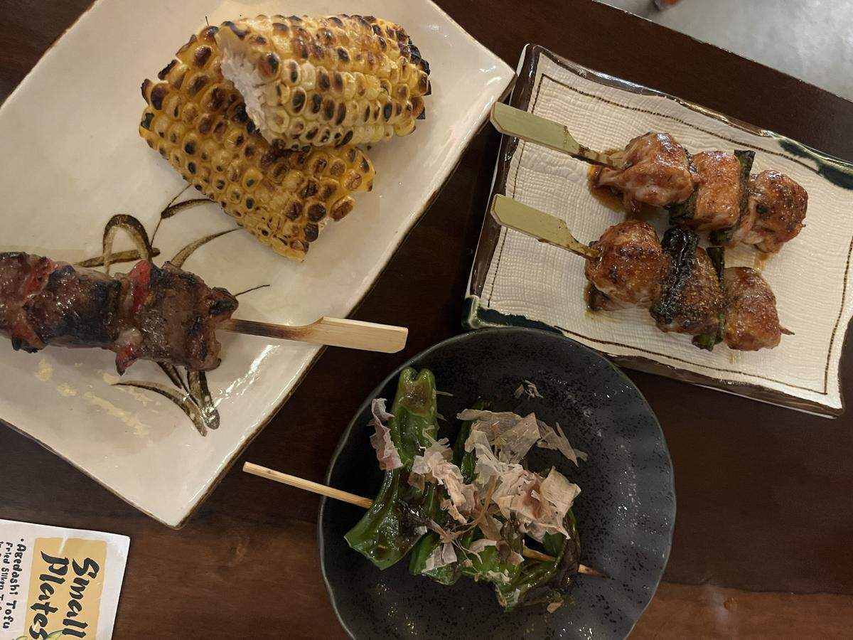 Charcoal grilled skewers at Ichirō Izakaya on Wednesday, Feb, 25 in Fort Worth. Pictured here is ribeye, corn, shishito peppers and negima chicken thighs.