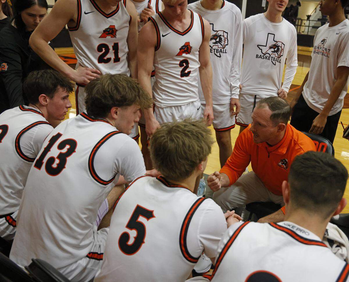 Aledo head coach Drew Baker talks to the team during a timeout against Brewer in the first half of a UIL boys basketball game at Aledo High School in Aledo, Texas, Friday Feb. 13, 2026.