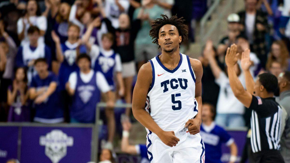 TCU forward Chuck O’Bannon Jr. (5) jogs down the floor after hitting a 3-point basket in the first half of an NCAA college basketball game against Arkansas-Pine Bluff in Fort Worth, Texas, Monday, Nov. 7, 2022. (AP Photo/Emil Lippe)