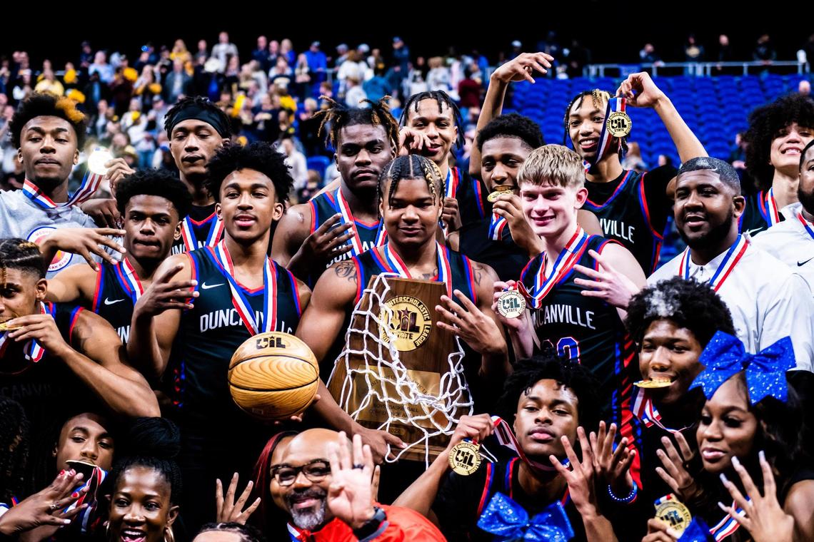 The Panthers with the championship trophy after winning the 6A state title 69-49 over McKinney in San Antonio, at the Alamodome, on March 12, 2022.