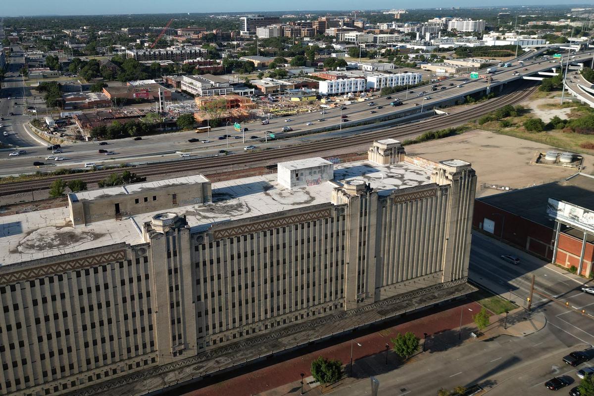 The T&P Warehouse can be seen between Interstate 30, above, and West Lancaster Avenue. The warehouse was supposed to be a pillar of Lancaster’s post-highway redevelopment, but the structure has sat vacant for decades, wilting away.