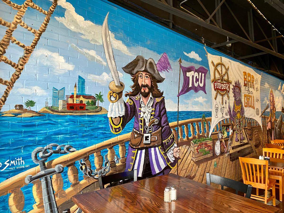 A mural by artist Brad Smith on the wall at the Poop Deck Bar & Grill in Fort Worth.