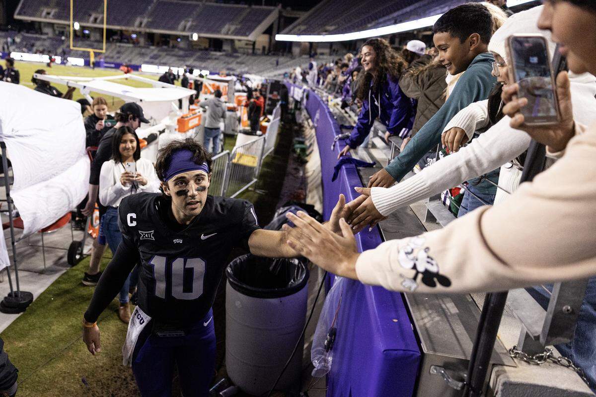 TCU quarterback Josh Hoover (10) says bye to fans after his final home game following a 45-23 Big XII conference win against the Cincinnati Bearcats at Amon G Carter Stadium in Fort Worth on Saturday, Nov. 29, 2025.