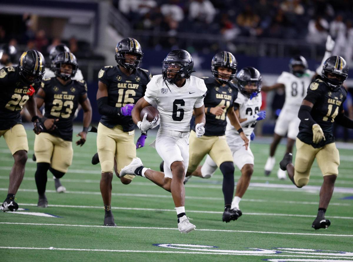 Richmond Randle athlete Sean Smith (6) leads everybody down field for a kick off return and the go-ahead score during the UIL 5A D2 State Championship football game at AT&T Stadium in Arlington, Texas, Friday, Dec. 20, 2024.