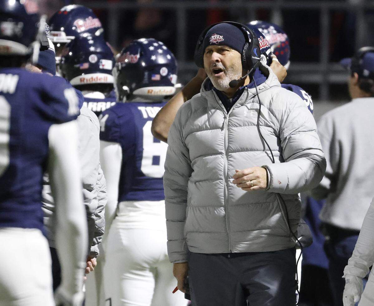 Denton Ryan head coach Dave Henigan reacts to a call on the field during the first half of a UIL Class 5A Division I Quarterfinal on Friday Dec. 05, 2025 at Northwest ISD Stadium in Fort Worth, Texas.