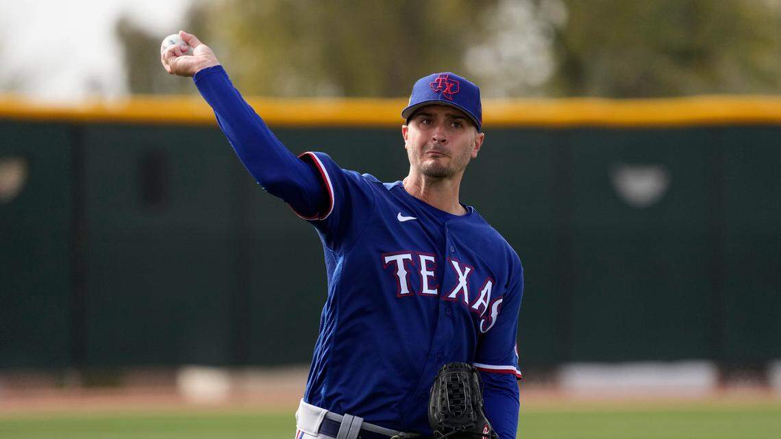 Texas Rangers pitcher Jake Odorizzi throws during spring training baseball practice on Friday in Surprise, Ariz. 