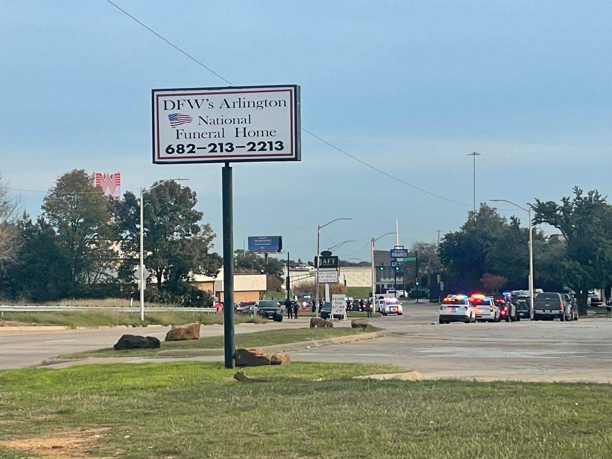 Fort Worth police respond to a 911 call reporting that an officer was shot Monday afternoon, Nov. 27, 2023 at the Fort Worth Community Credit Union on Brentwood Stair Road.