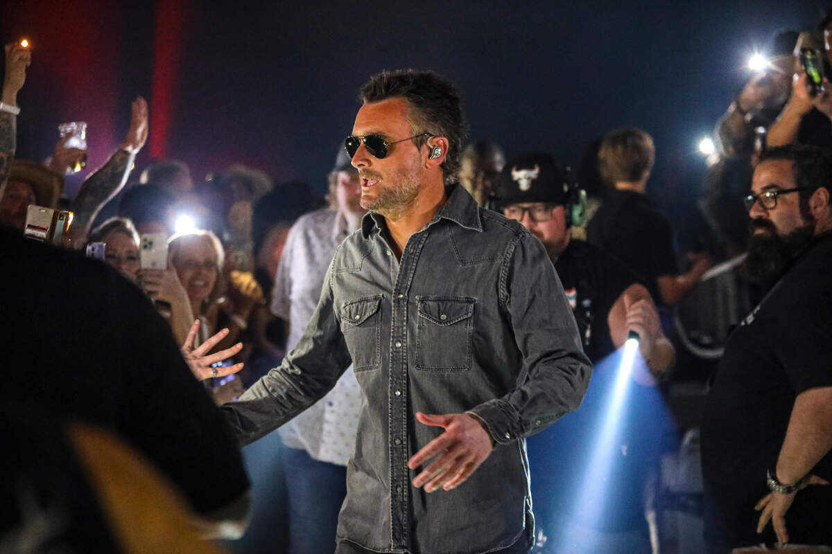 Eric Church took the stage by himself at 9:10 p.m. Friday and opened the show with a 15-minute medley of classics written by Texas songwriters. His six-piece band and backup singer joined him after the medley and together they played more than 30 songs.